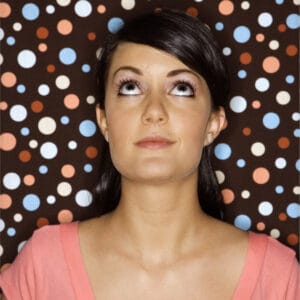 Woman rolling her eyes back