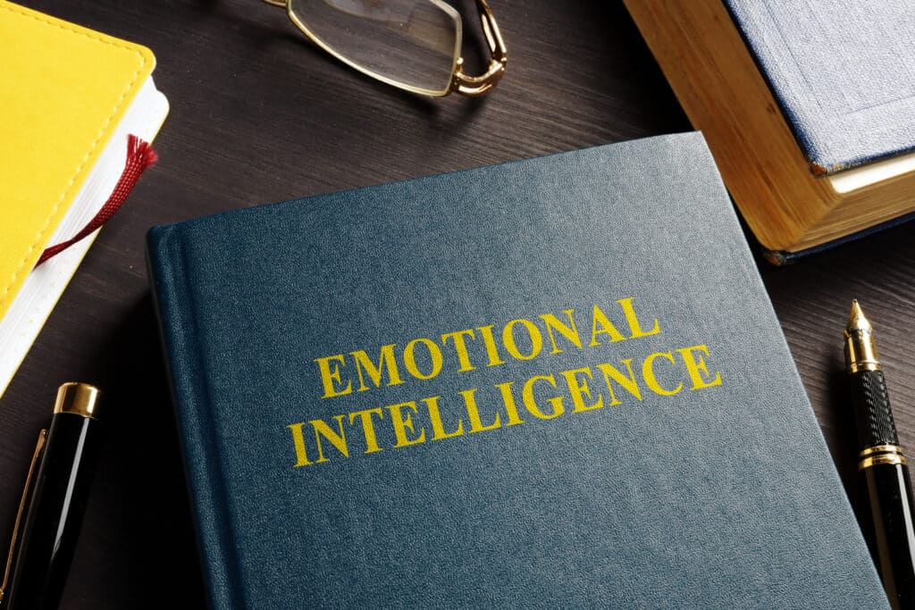 A book about emotional intelligence resting on a desk